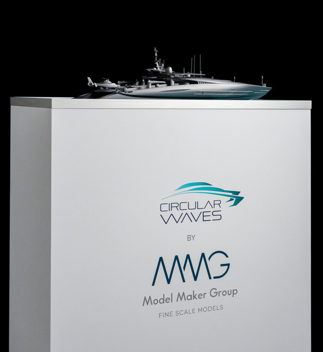 a model ship on a white box